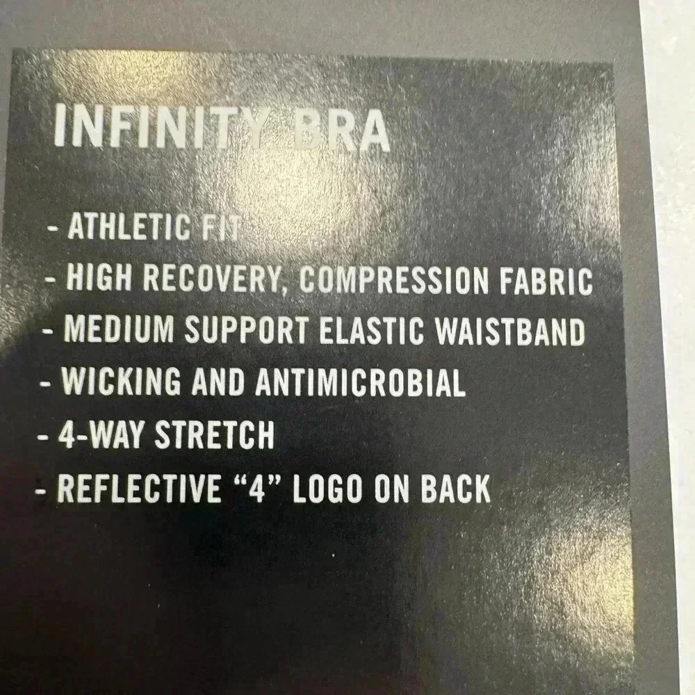 Fourlaps infinity sports bra teal, black & white camo racer back size medium